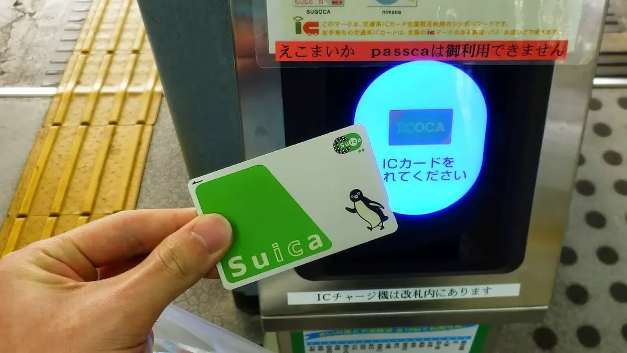 Suica IC card tapped at a station gate in Japan