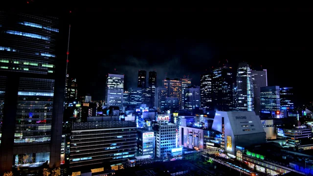 Shinjuku Station south entrance at night, representative of Shinjuku first-timer hotel bases